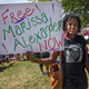 Abena Hutchful holds a sign in support of Marissa Alexander at the 50th anniversary of the March on Washington in 2013. (Tony Savino/Corbis via Getty Images)
